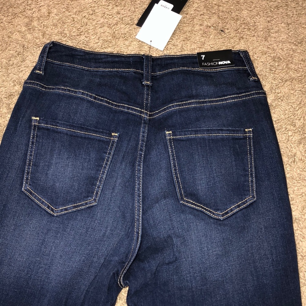 High Rise Distressed Jeans - Picture 8 of 9